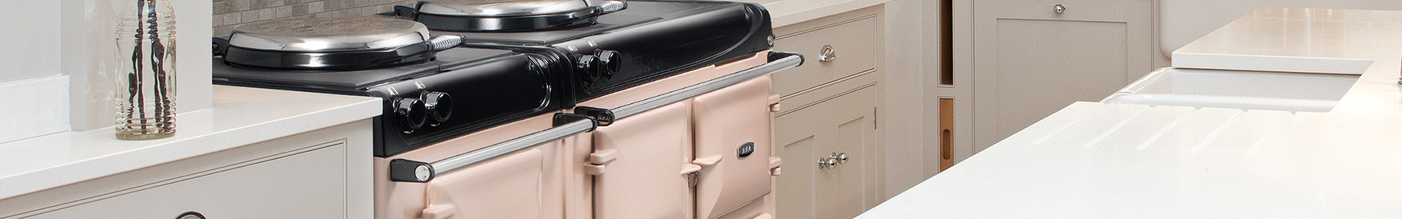 AGA eR3 Series 160 in Blush with white cabinetry 