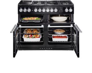 Falcon range cooker with food in two ovens, the grill and the slow cook oven 